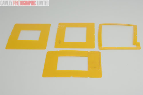 Sinar Masks Set of Four Transparent Yellow (534.16). Graded: AS-IS [#10360]