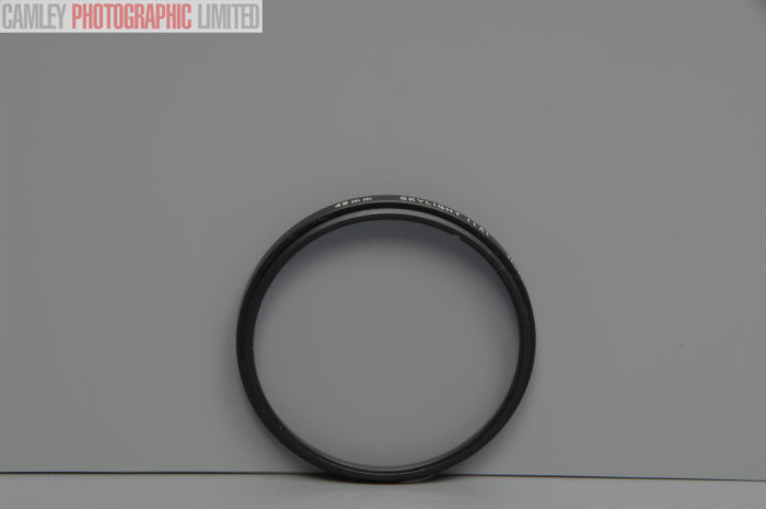 Olympus 49mm Skylight (1A) filter. Nice and clean. Graded: EXC+ [#10566] - Image 2