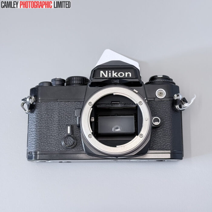 Nikon FE 35mm SLR Film Camera Body in Black. Condition: EXC